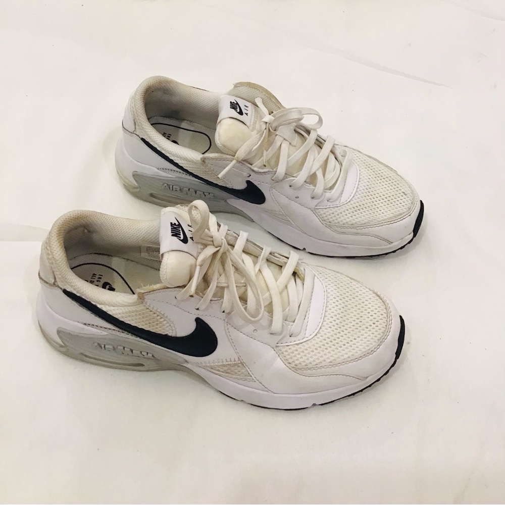 Nike Men’s White Sneakers with Black Swoosh